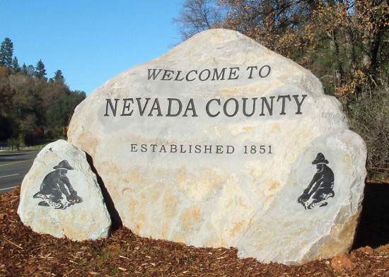 Welcome to Nevada County boulder sign.